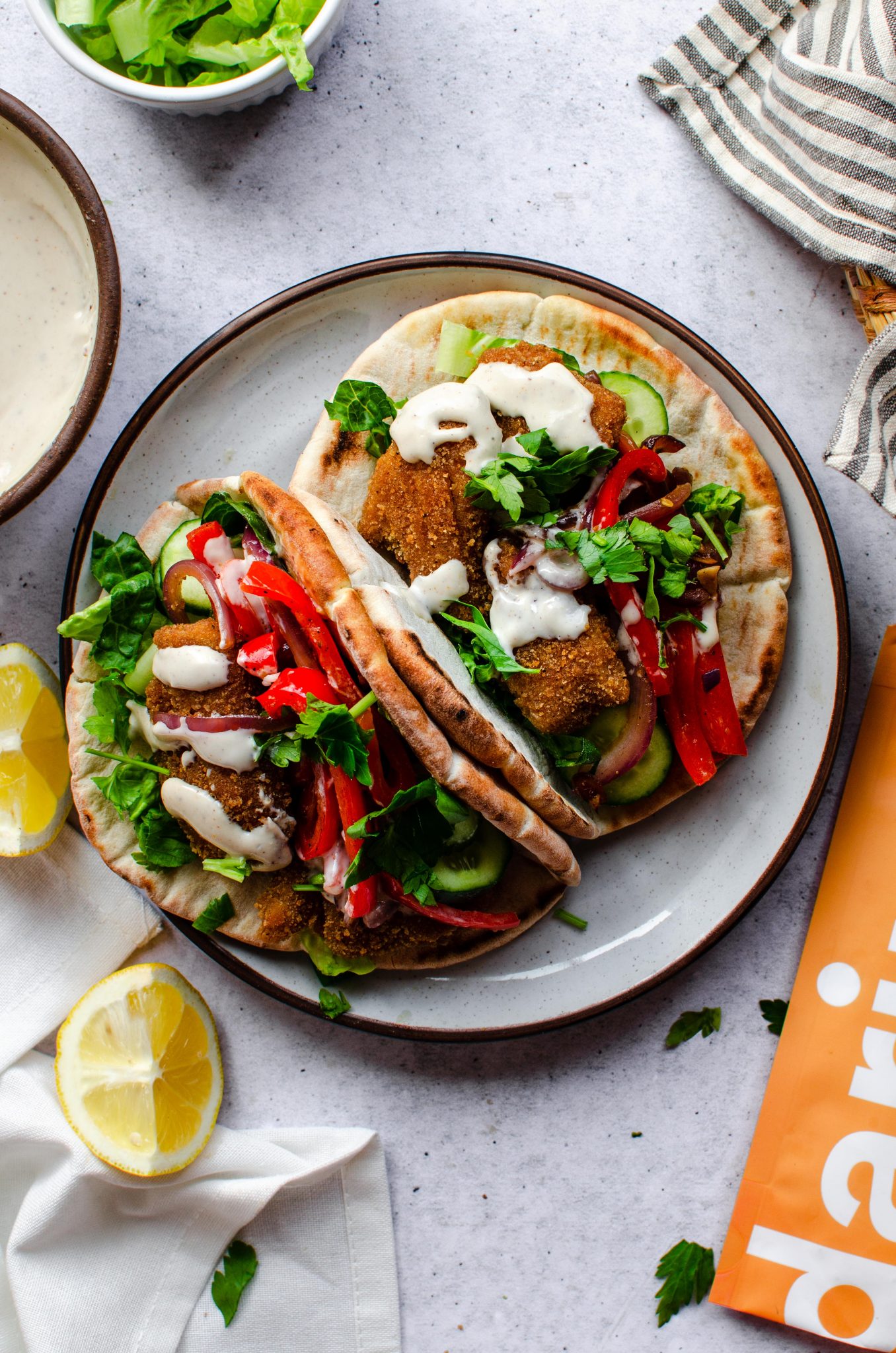 Halal chicken shawarma-spiced pita pocket with tahini for portable picnic sandwich